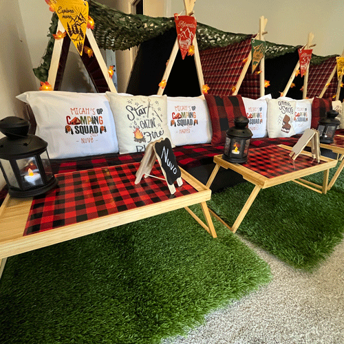 Camp Out themed sleepover fort party setup