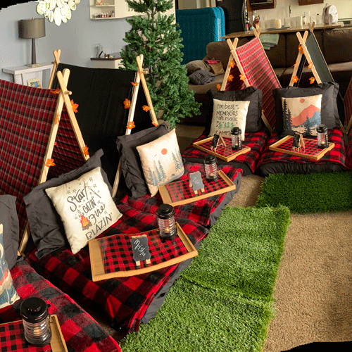Camp Out themed sleepover fort party setup