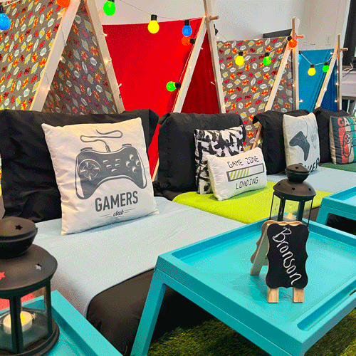 Gamer themed sleepover fort party setup