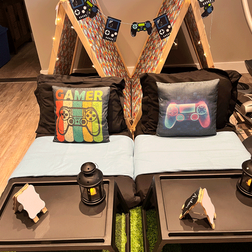 Gamer themed sleepover fort party setup
