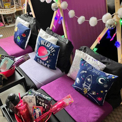 Outer Space themed sleepover fort party setup