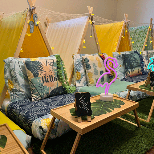 Tropical Vacation themed sleepover fort party setup